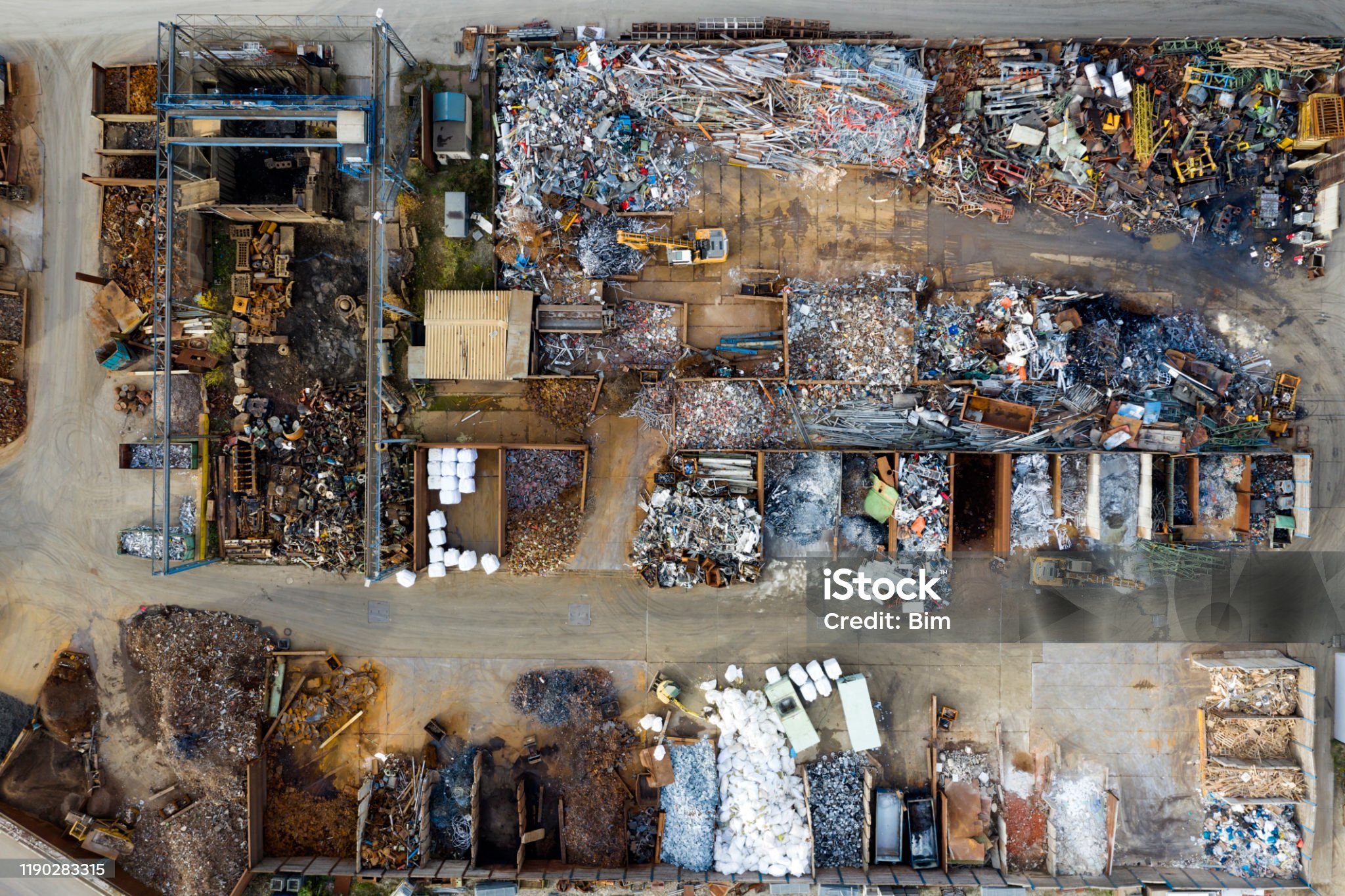 Directly above view of scrap metal yard.